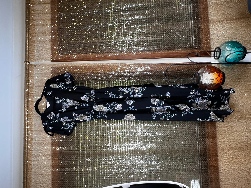 Black and floral mock wrap dress